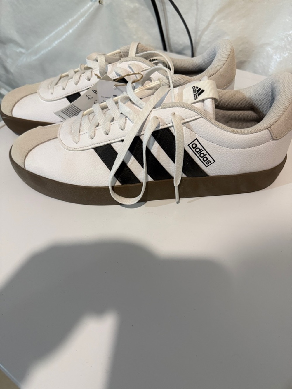 adidas White Sneakers with Black Stripes and Brown Sole